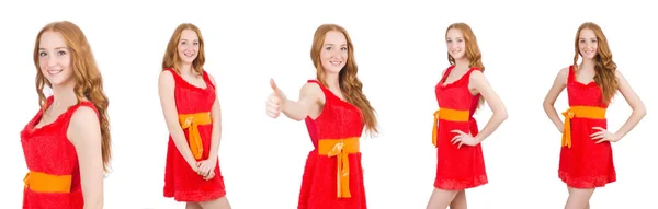 Young beautiful girl in red dress thunms up isolated on white — Stock Photo, Image