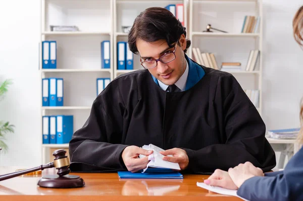 Young woman visiting male lawyer — Stock Photo, Image