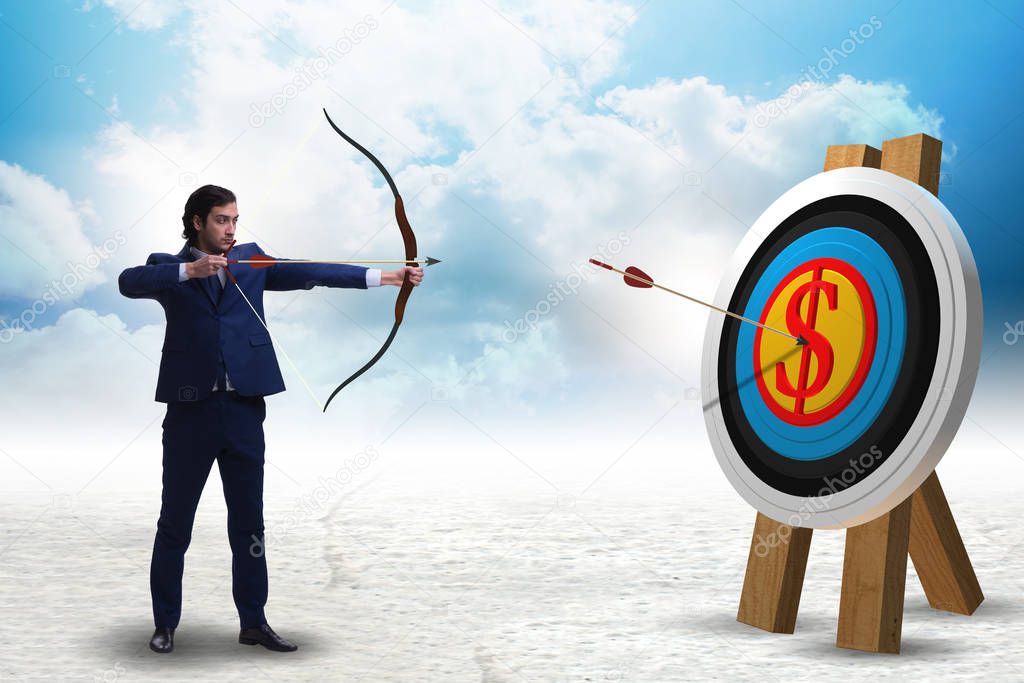 Businessman aiming arrow with bow