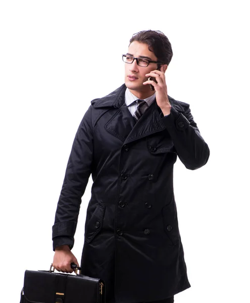 Joven hombre de negocios con abrigo de invierno aislado en blanco — Foto de Stock