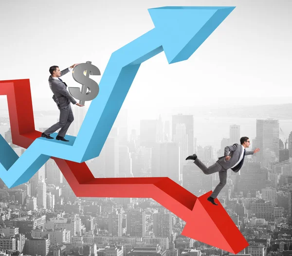 Üzletember növekedési és hanyatlási táblázatokkal — Stock Fotó