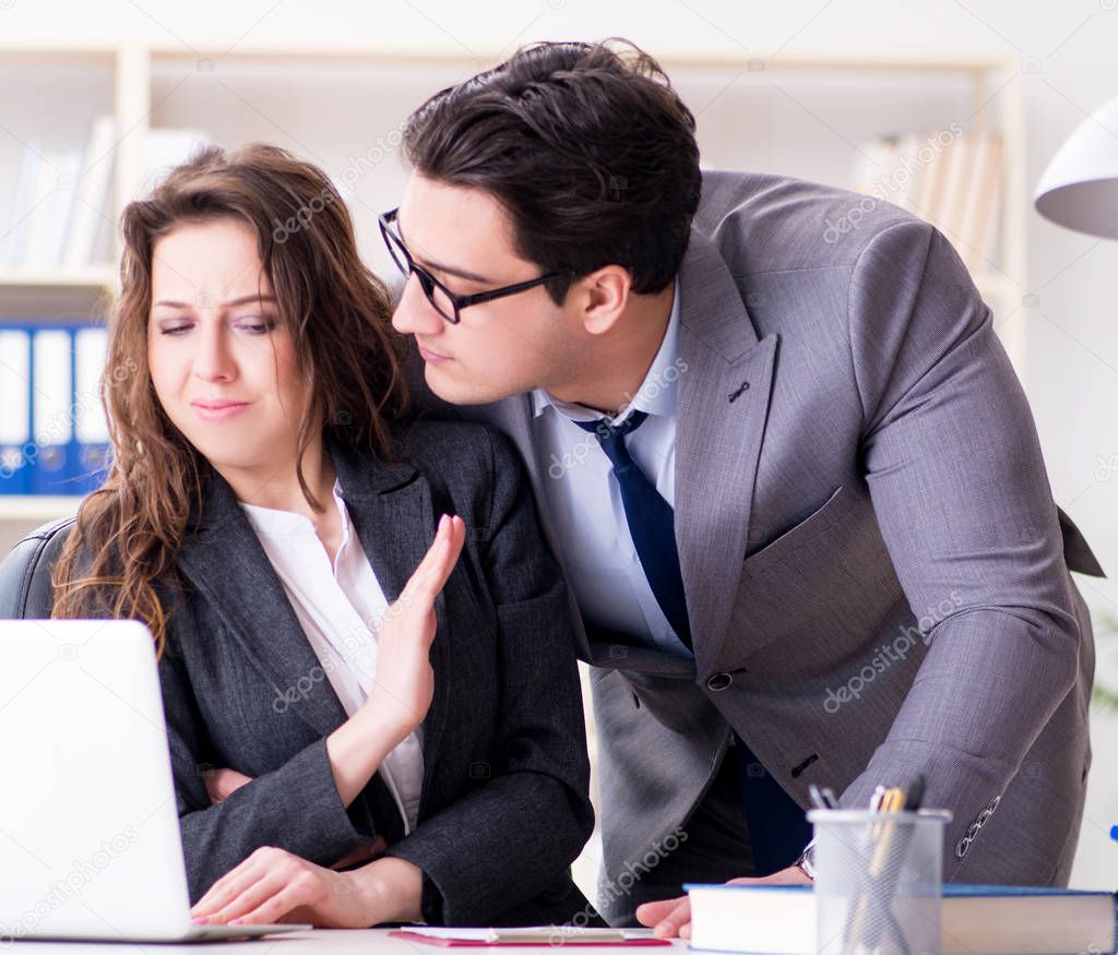 Sexual harassment concept with man and woman in office