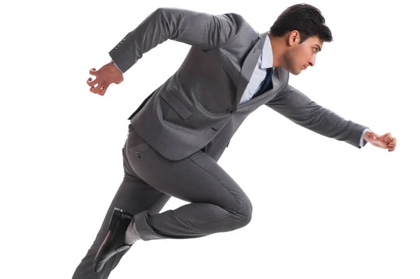 Молодий бізнесмен біжить вперед ізольовано на білому — стокове фото