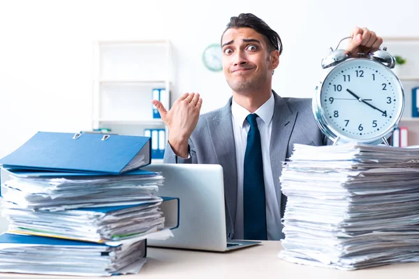 Businessman with heavy paperwork workload — Stock Photo, Image