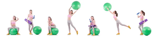Mulher exercitando com bola suíça no branco — Fotografia de Stock