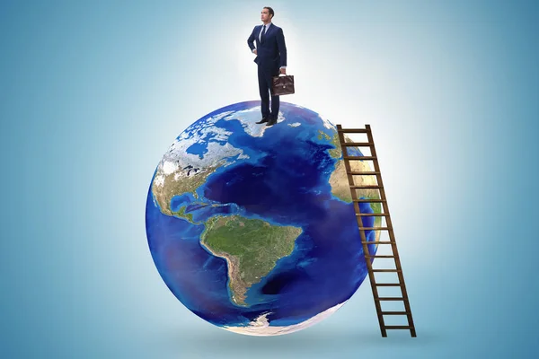 Businessman on top of the world — Stock Photo, Image