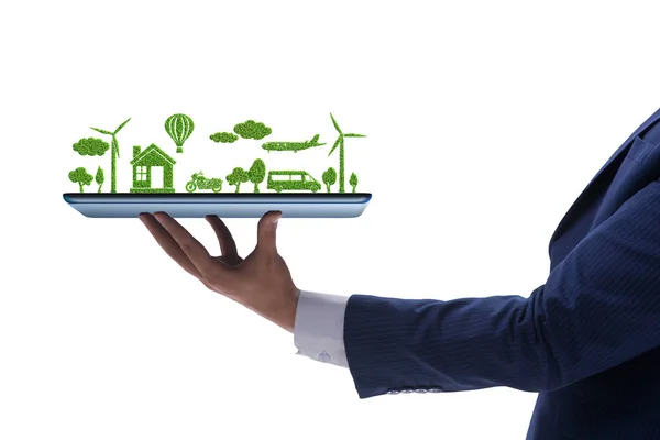 Hand holding tablet with mini ecosystem and clean energy — Stock Photo, Image