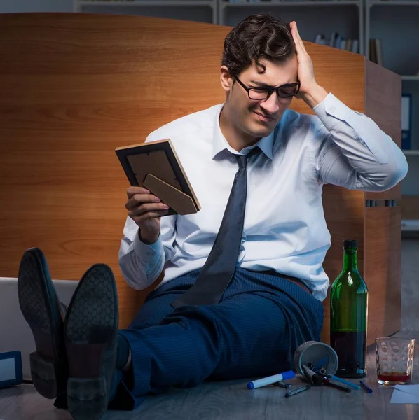 Sad employee in office missing his wife after divorce separation — Stock Photo, Image