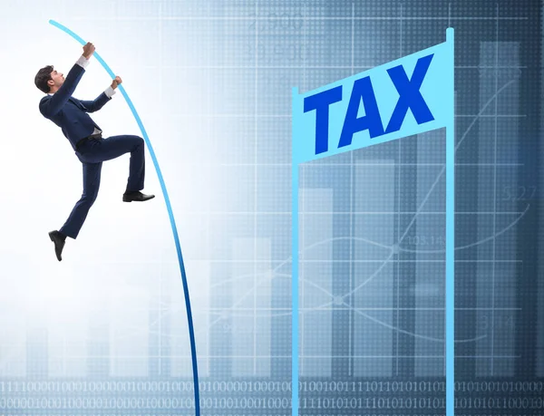 The businessman jumping over tax in tax evasion avoidance concep — Stock Photo, Image