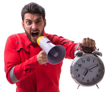 Bir megafon ve üzerinde izole bir çalar saat ile genç tamirci