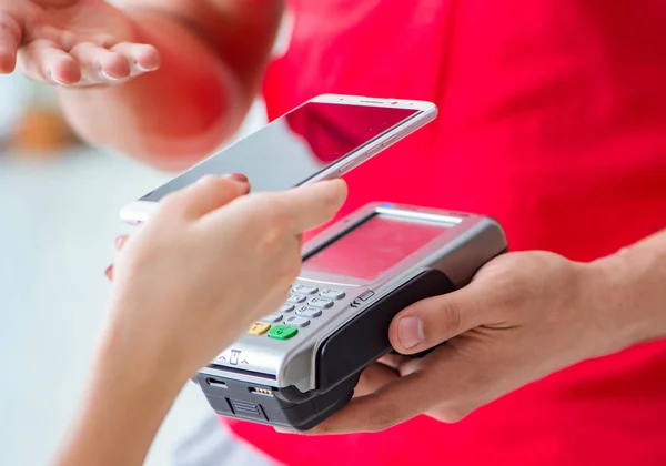 Concept of paying with POS terminal — Stock Photo, Image