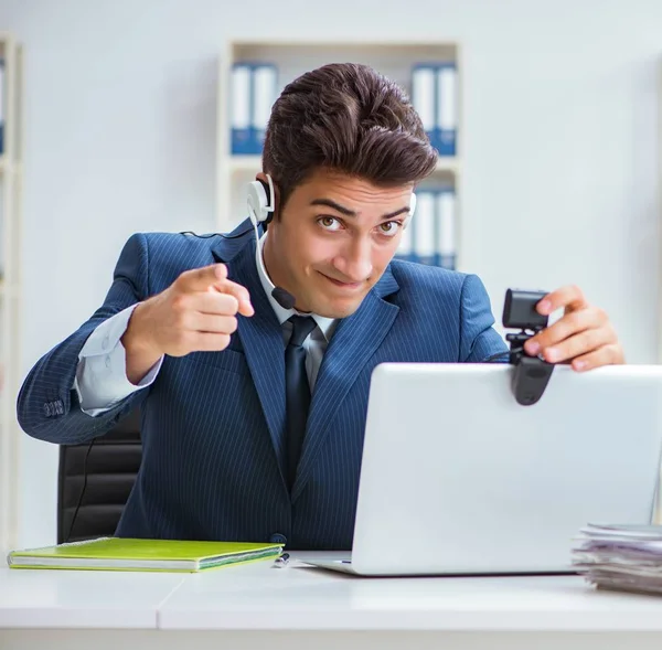 Young help desk operator working in office