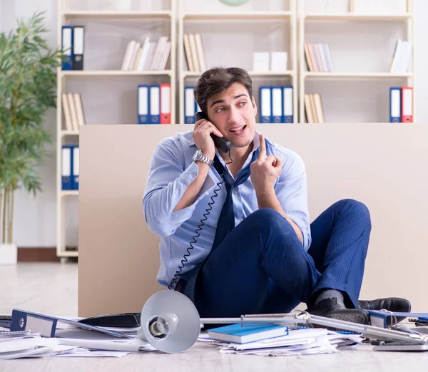 Businessman frustrated at many telephone calls