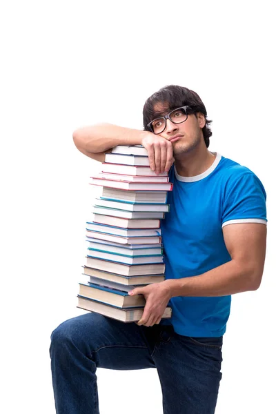 Männlicher Student mit vielen Büchern isoliert auf weiß — Stockfoto