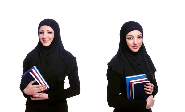 Mujer musulmana joven con libro sobre blanco —  Fotos de Stock