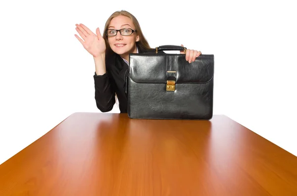 Employée assise à une longue table isolée sur du blanc — Photo