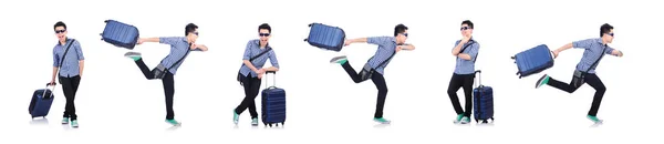 Νεαρός με ταξιδιωτική βαλίτσα στα λευκά — Φωτογραφία Αρχείου