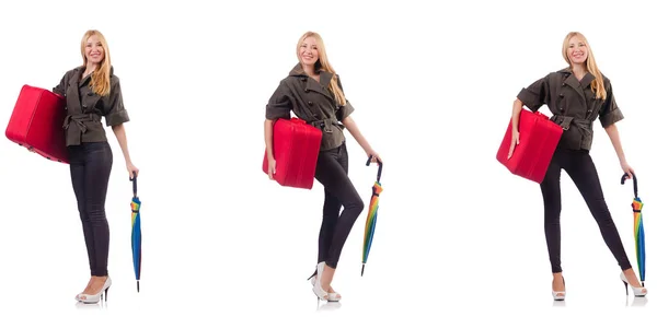 Młoda piękna kobieta z walizką i parasolem odizolowana na whi — Zdjęcie stockowe
