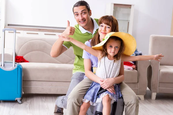 Happy family planning vacation trip — Stock Photo, Image