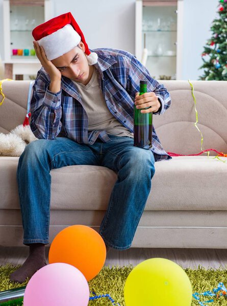 Man having hangover after christmas party