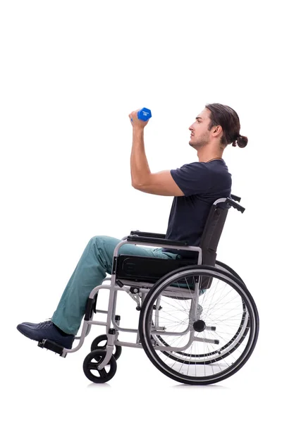 Joven hombre discapacitado haciendo ejercicios físicos aislados en blanco —  Fotos de Stock