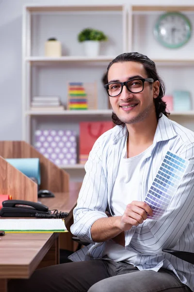 Young male designer working in the office — Stock Photo, Image