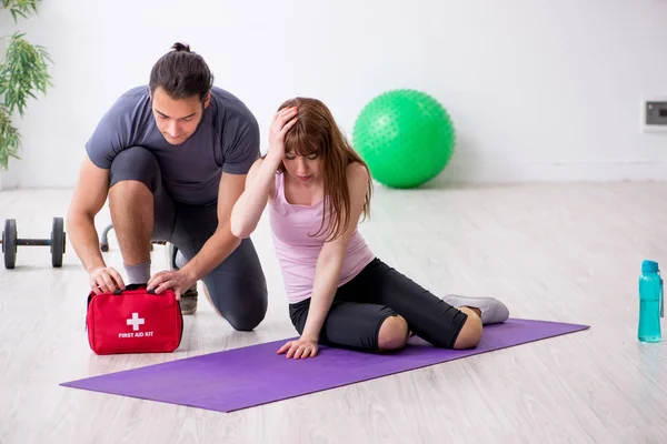 Young woman feeling bad during training in first aid concept