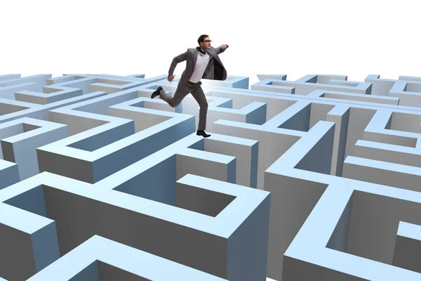 Businessman trying to escape from maze — Stock Photo, Image