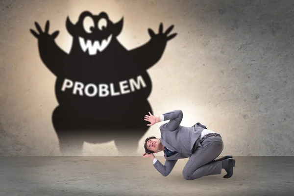 Businessman afraid of big problem