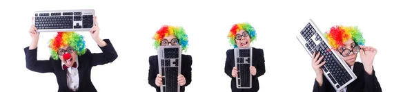 Funny clown with keyboard on white — Stock Photo, Image