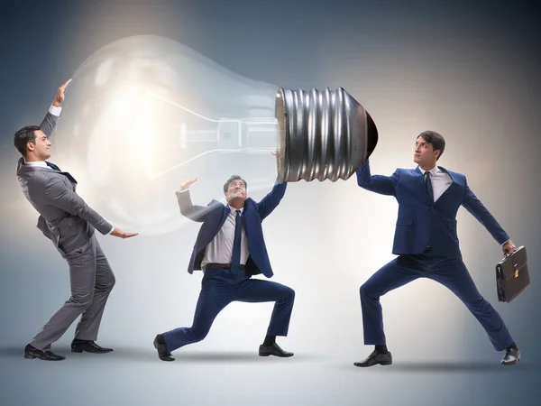 Businessmen in bright idea concept — Stock Photo, Image