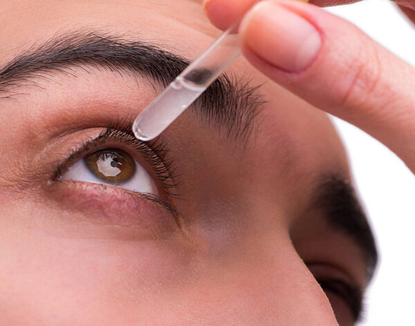 Young man in eye care medical concept