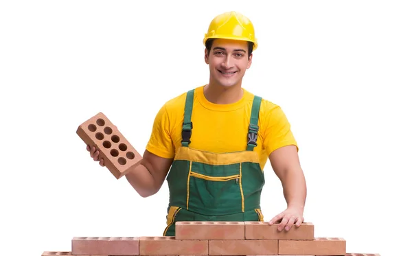 The handsome construction worker building brick wall — Stock Photo, Image