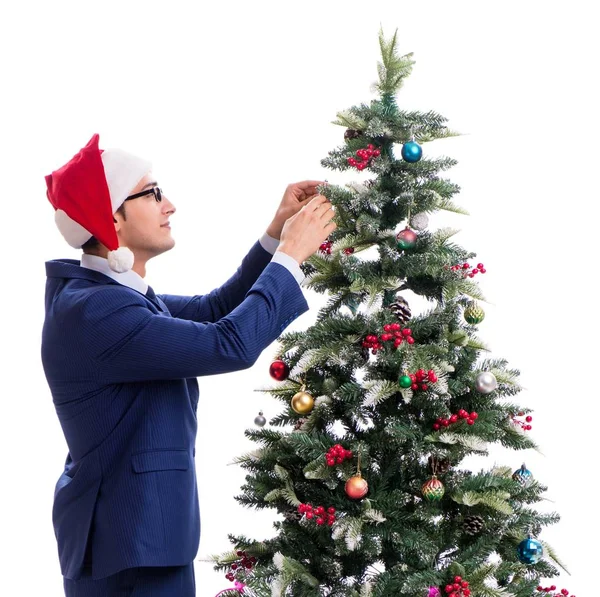 白地に孤立したクリスマスツリーを飾るビジネスマン — ストック写真