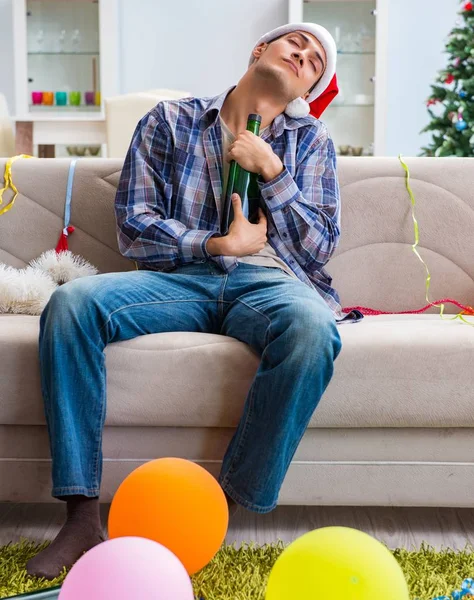 Man having hangover after christmas party — Stock Photo, Image