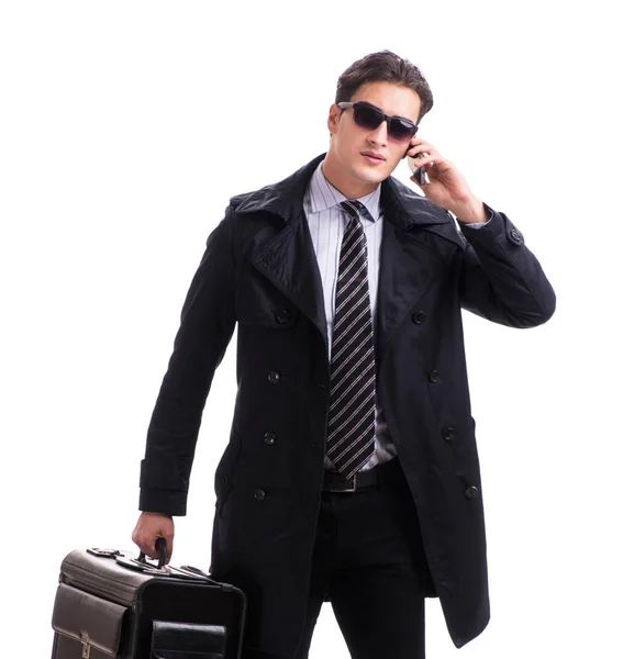 Giovane uomo d'affari con valigia pronta per il viaggio d'affari su bianco — Foto Stock