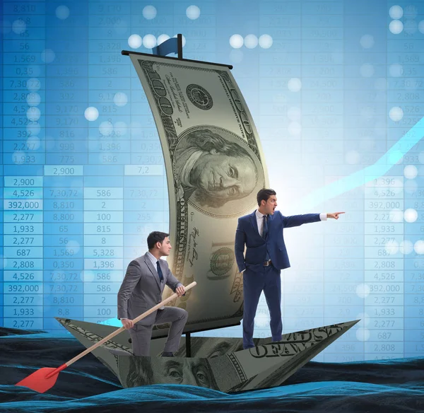 Het zakenpartnerschap met zakenlieden die op een dollarboot varen — Stockfoto