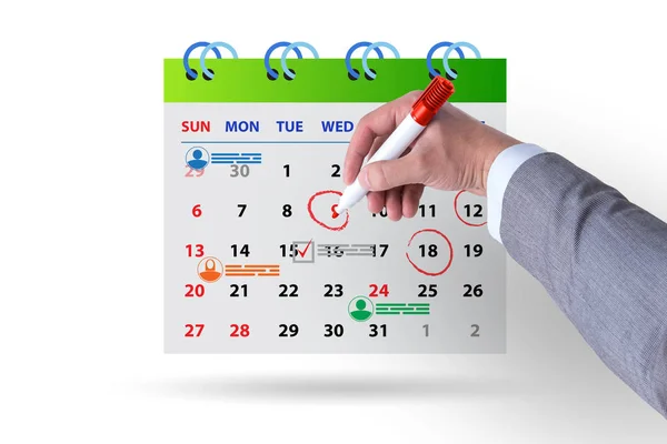 Koncepcja kalendarza biznesowego z biznesmenem — Zdjęcie stockowe