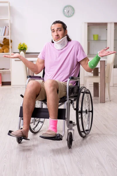 Young man suffering at home after car accident — Stock Photo, Image