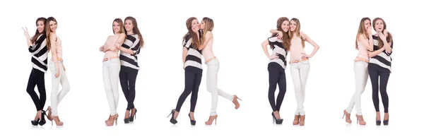 Két női barát elszigetelve a fehéren. — Stock Fotó
