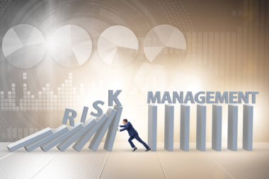 Businessman in risk management concept clipart