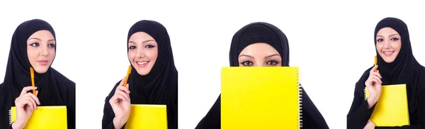 Mujer musulmana joven con libro sobre blanco — Foto de Stock