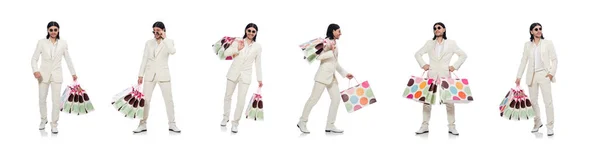 Hombre con bolsas aisladas en blanco — Foto de Stock