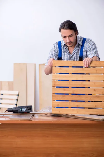 Young male carpenter working indoors — Stock Photo, Image