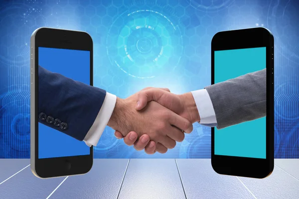 stock image Concept of communication with businessmen handshaking