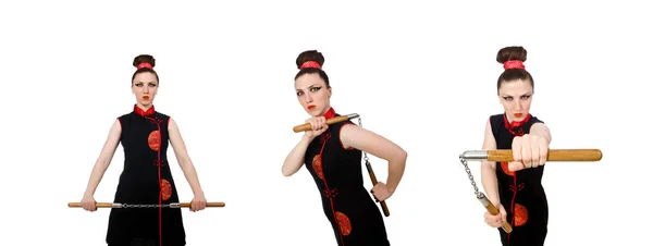 Funny woman with nunchucks isolated on white — Stock Photo, Image