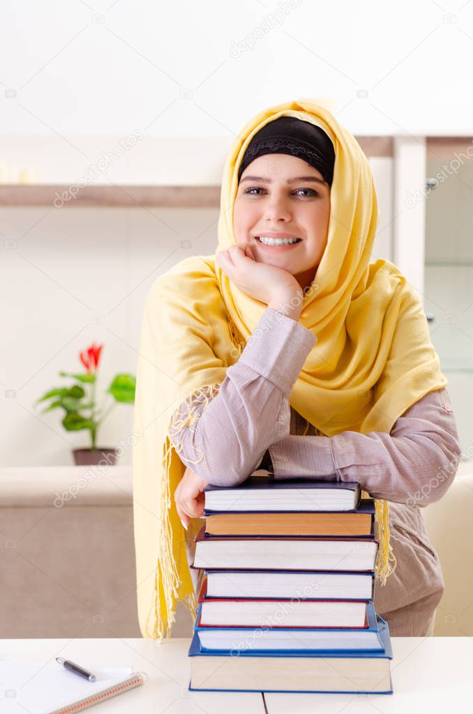 Female student in hijab preparing for exams