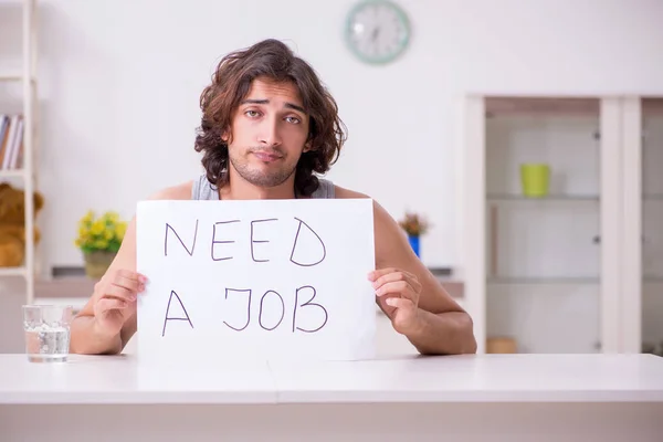 Unemployed man desperate at home — Stock Photo, Image