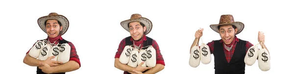 Beyaz izole para çantaları ile genç kovboy — Stok fotoğraf