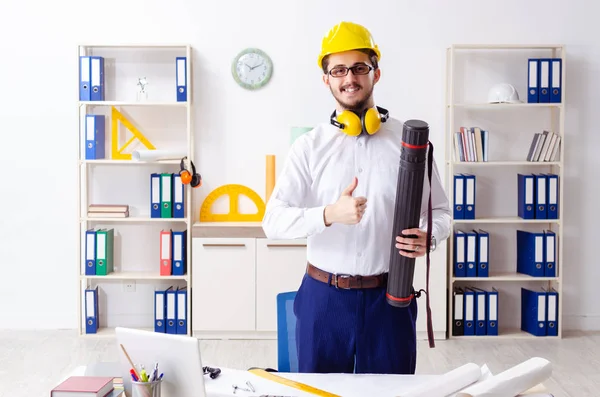 Young male architect working in the office — Stock Photo, Image